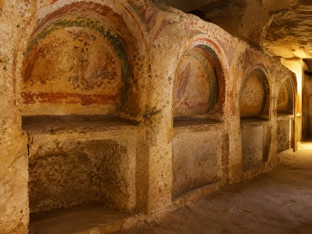 Gallery carved into tufa in the Catacombs of San Gennaro in Naples